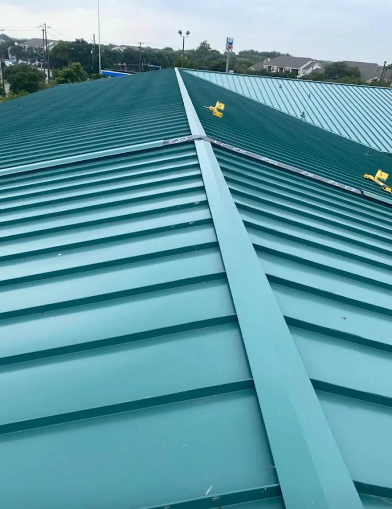 Green commercial metal roof ridge and valley for Metal Roof Repair in Pismo Beach